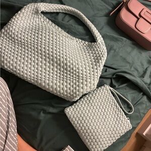 Blue woven tote with pouch.